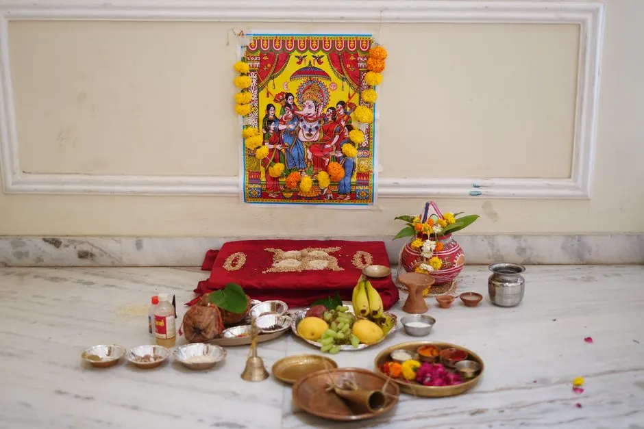Wooden pooja unit with marble platform and warm LED backlighting