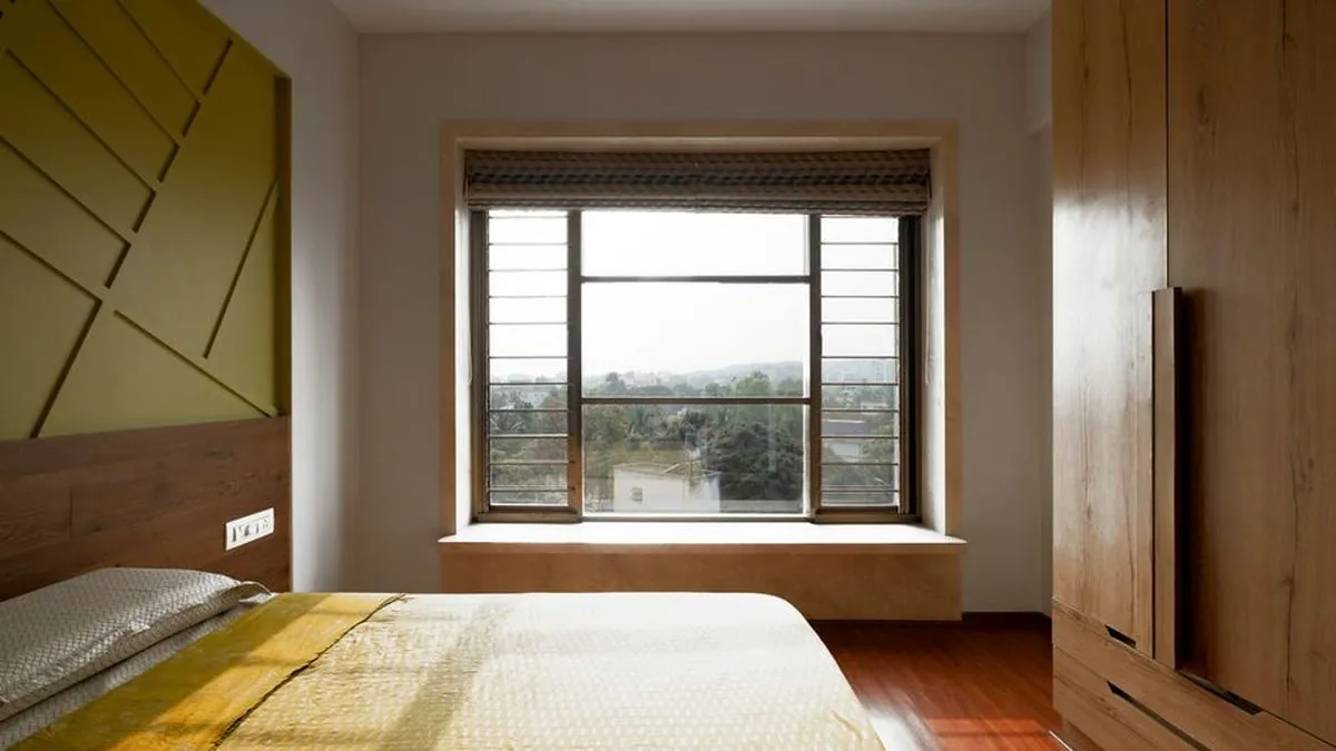 Daylit modern Indian apartment interior with an open living space