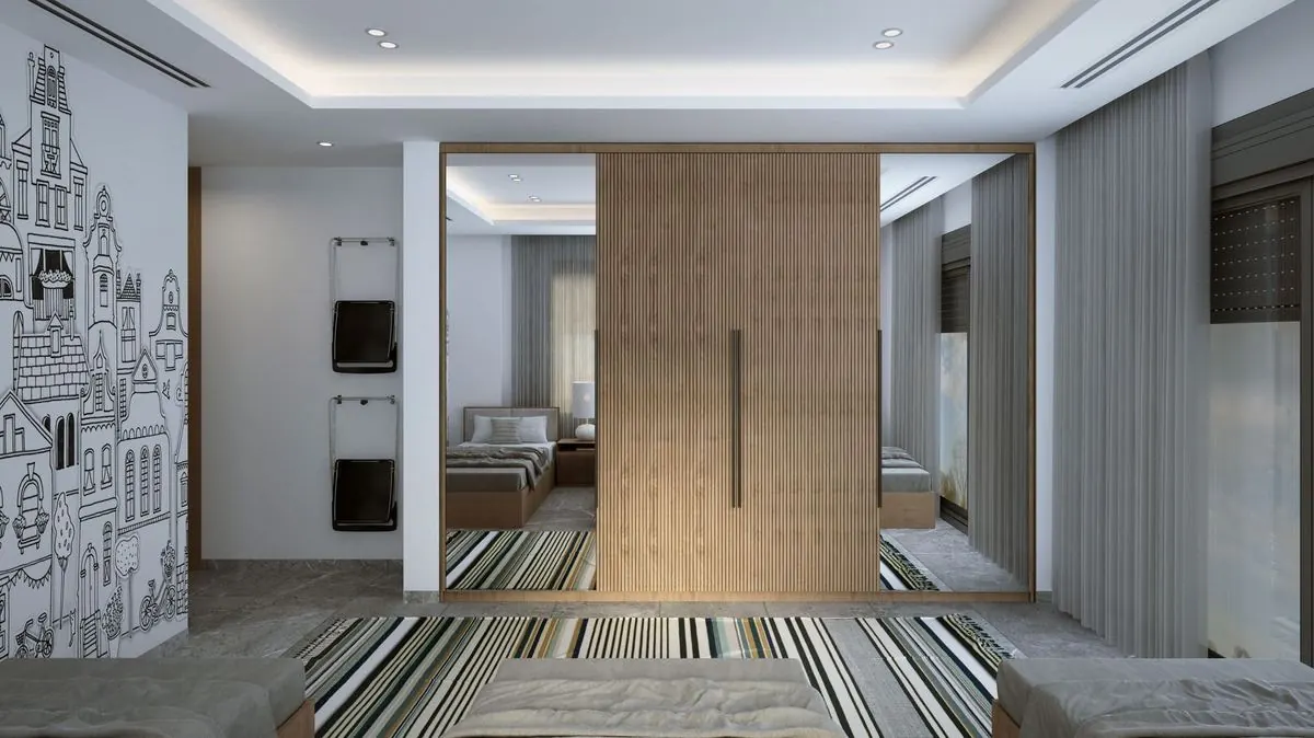 Sliding wardrobe with fluted wood shutter and mirror panels in a bedroom